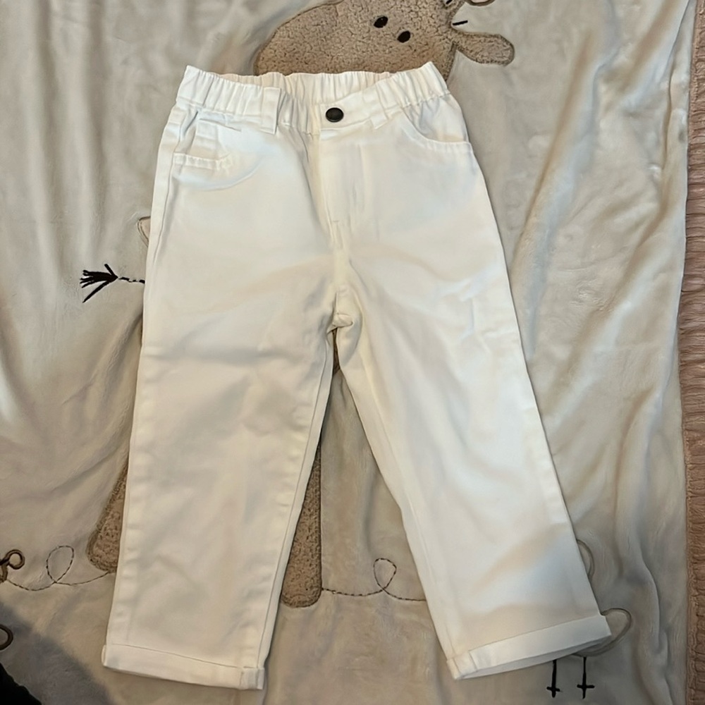 White capri pants. Brand new. 18 months
